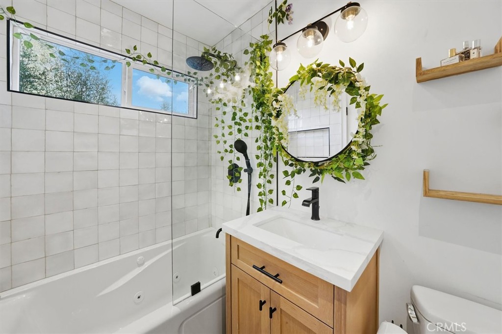 28933 Wagon Road Agoura Hills, CA 91301 - Photo 57 of 73 a bathroom with a sink toilet and shower