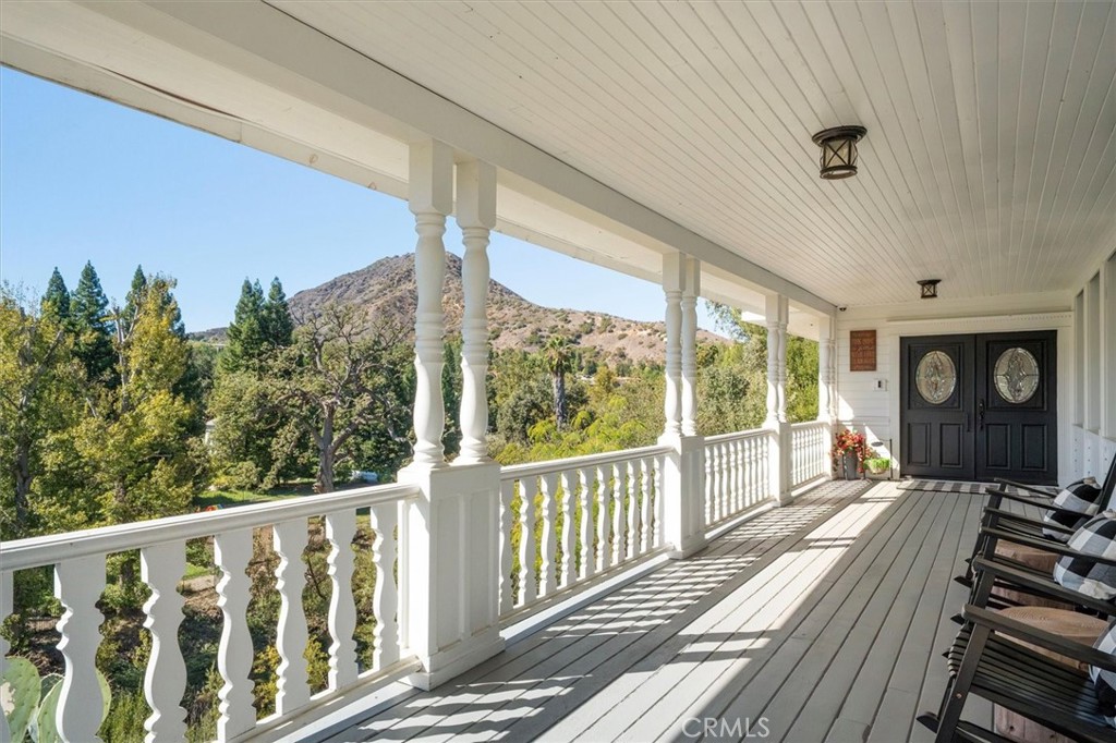 28933 Wagon Road Agoura Hills, CA 91301 - Photo 8 of 73 a view of a balcony with chairs