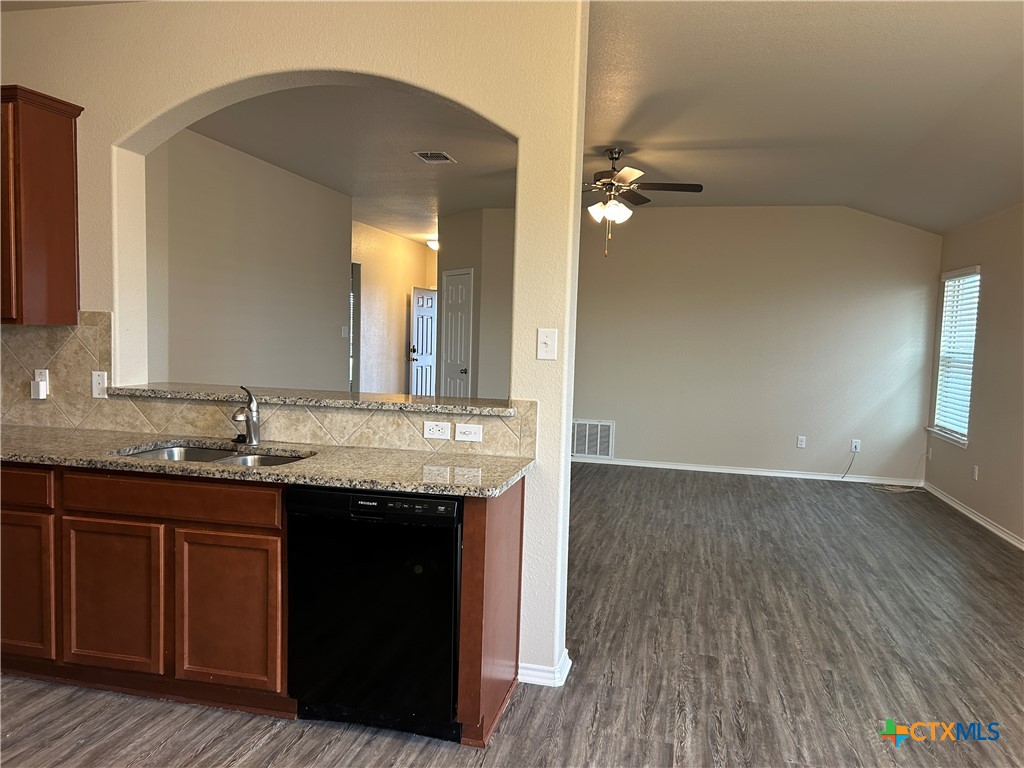 137 Bainbridge Road Temple, TX 76502 - Photo 12 of 26 a bathroom with a granite countertop sink and a mirror
