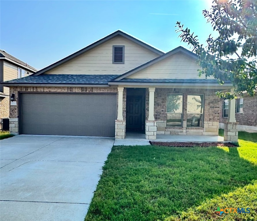 137 Bainbridge Road Temple, TX 76502 - Photo 3 of 26 a front view of house with yard and glass windows