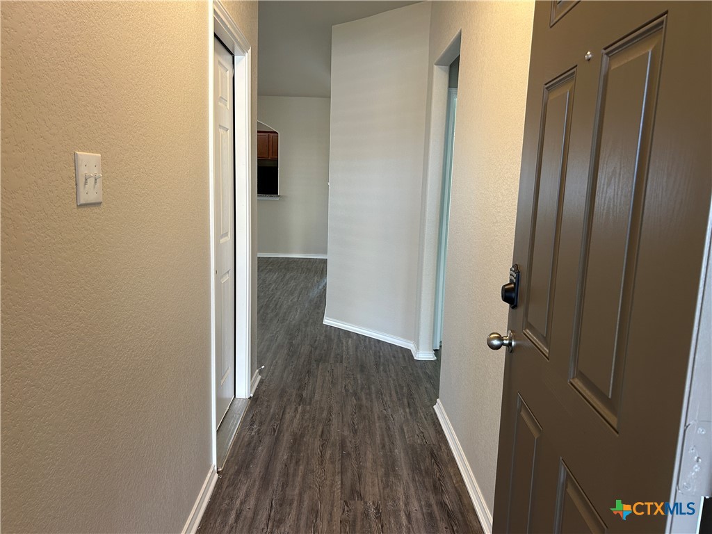 137 Bainbridge Road Temple, TX 76502 - Photo 5 of 26 a view of a hallway with wooden floor
