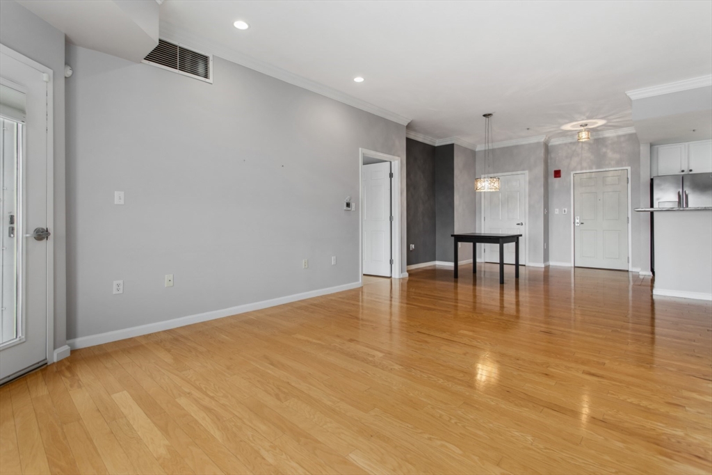 36 Village Road, Unit 404 Middleton, MA 01949 - Photo 14 of 41 a view of an empty room with a window