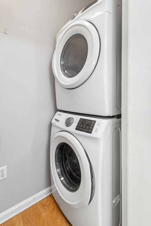 36 Village Road, Unit 404 Middleton, MA 01949 - Photo 31 of 41 a utility room with dryer and washer