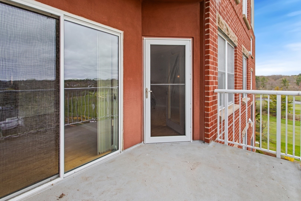 36 Village Road, Unit 404 Middleton, MA 01949 - Photo 34 of 41 a view of a balcony