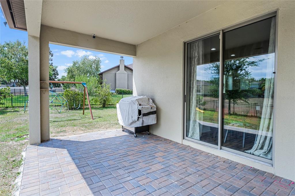 30215 Bretton Loop Mount Dora, FL 32757 - Photo 23 of 32 a house view with a garden space