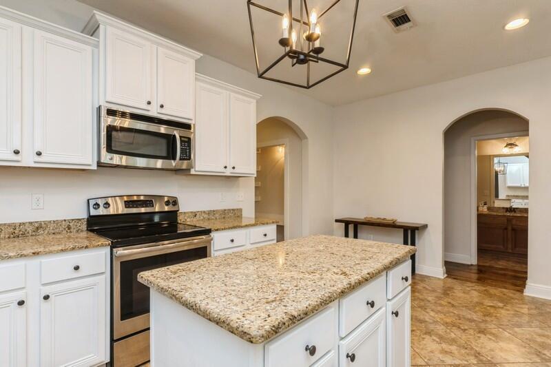 3362 Citrine Circle Crestview, FL 32539 - Photo 20 of 42 a kitchen with stainless steel appliances granite countertop a granite counter tops and white cabinets
