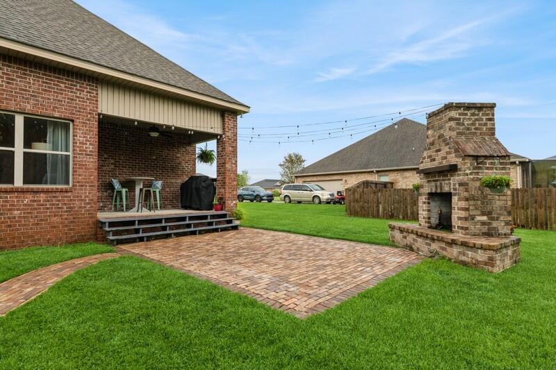 3362 Citrine Circle Crestview, FL 32539 - Photo 2 of 42 a view of a chair and table in backyard of the house