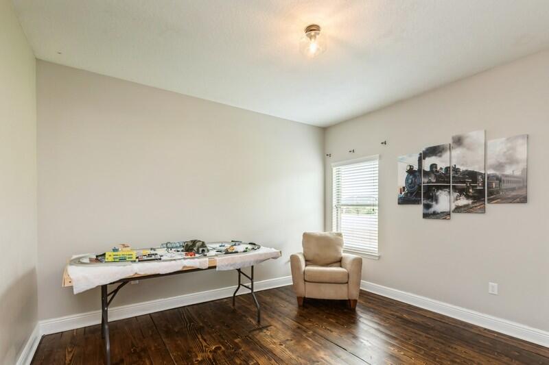 3362 Citrine Circle Crestview, FL 32539 - Photo 31 of 42 a living room with furniture and wooden floor
