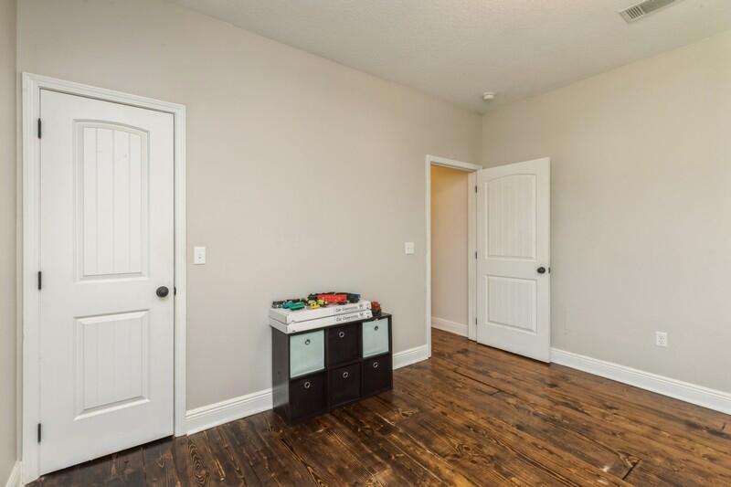 3362 Citrine Circle Crestview, FL 32539 - Photo 32 of 42 a view of room with wooden floor and closet