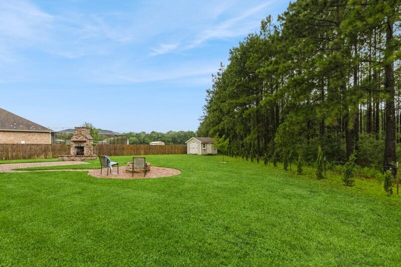 3362 Citrine Circle Crestview, FL 32539 - Photo 6 of 42 a view of a green field with clear sky