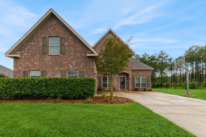 3362 Citrine Circle Crestview, FL 32539 - Photo 8 of 42 front view of a house with a yard