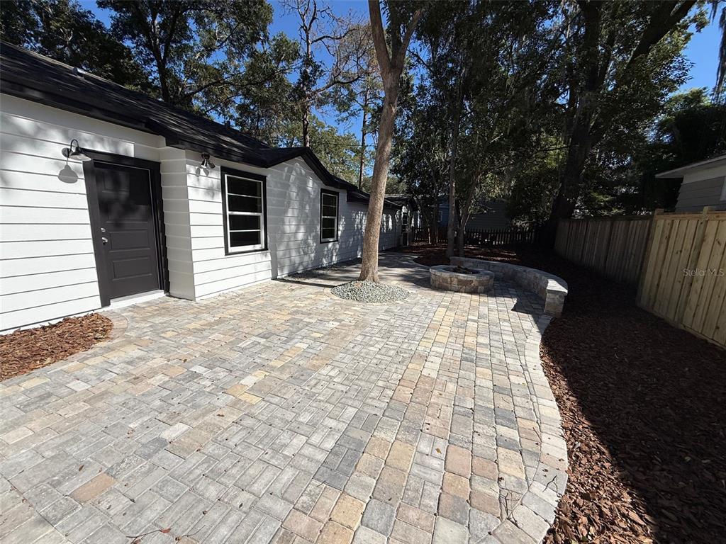 1217 Northeast 4 Street Gainesville, FL 32601 - Photo 25 of 36 a front view of a house with a yard