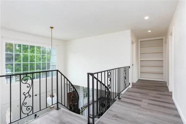 a view of a hallway with staircase