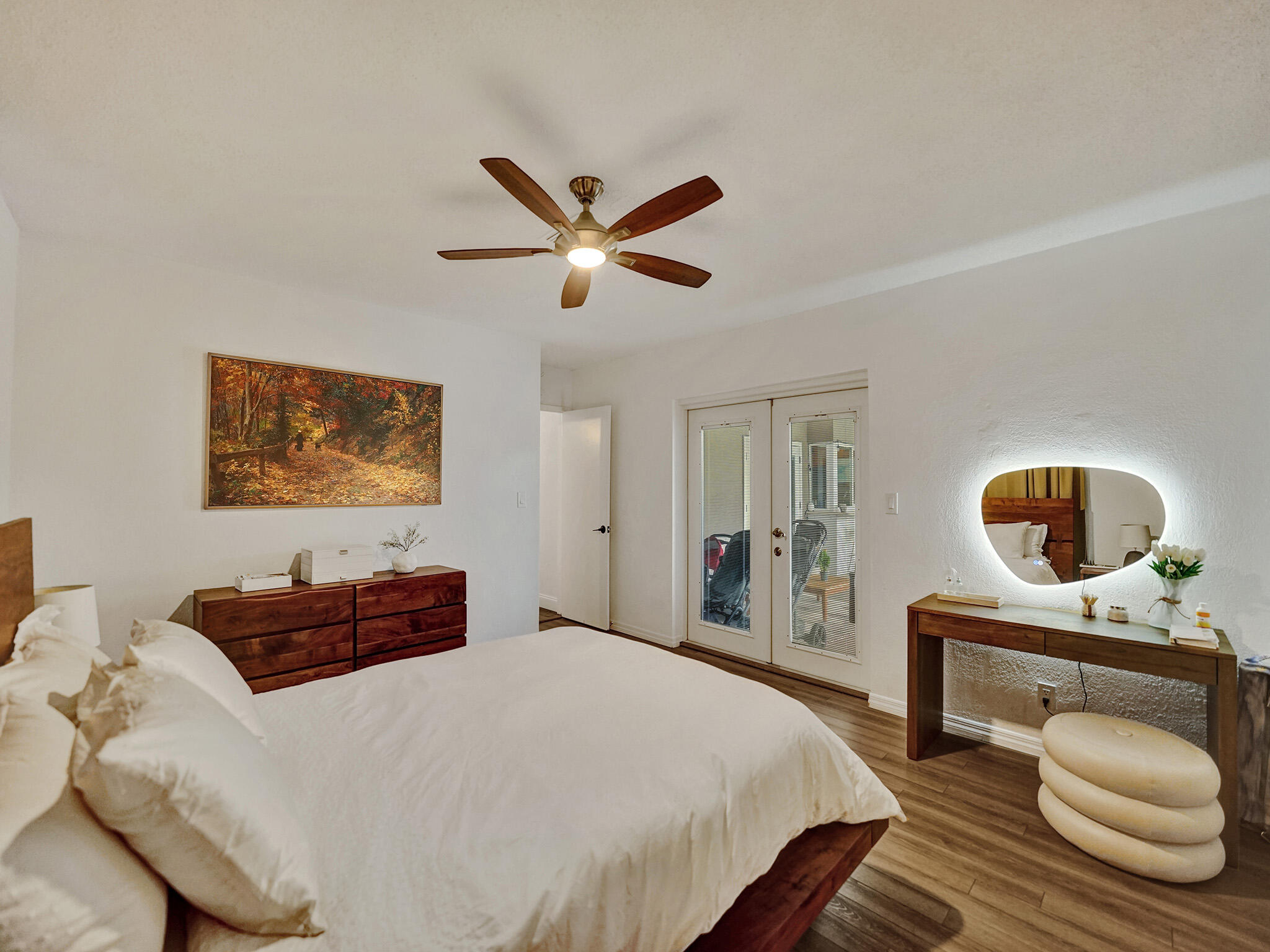 4533 Jefferson Street Hollywood, FL 33021 - Photo 11 of 29 a bedroom with a bed and dresser
