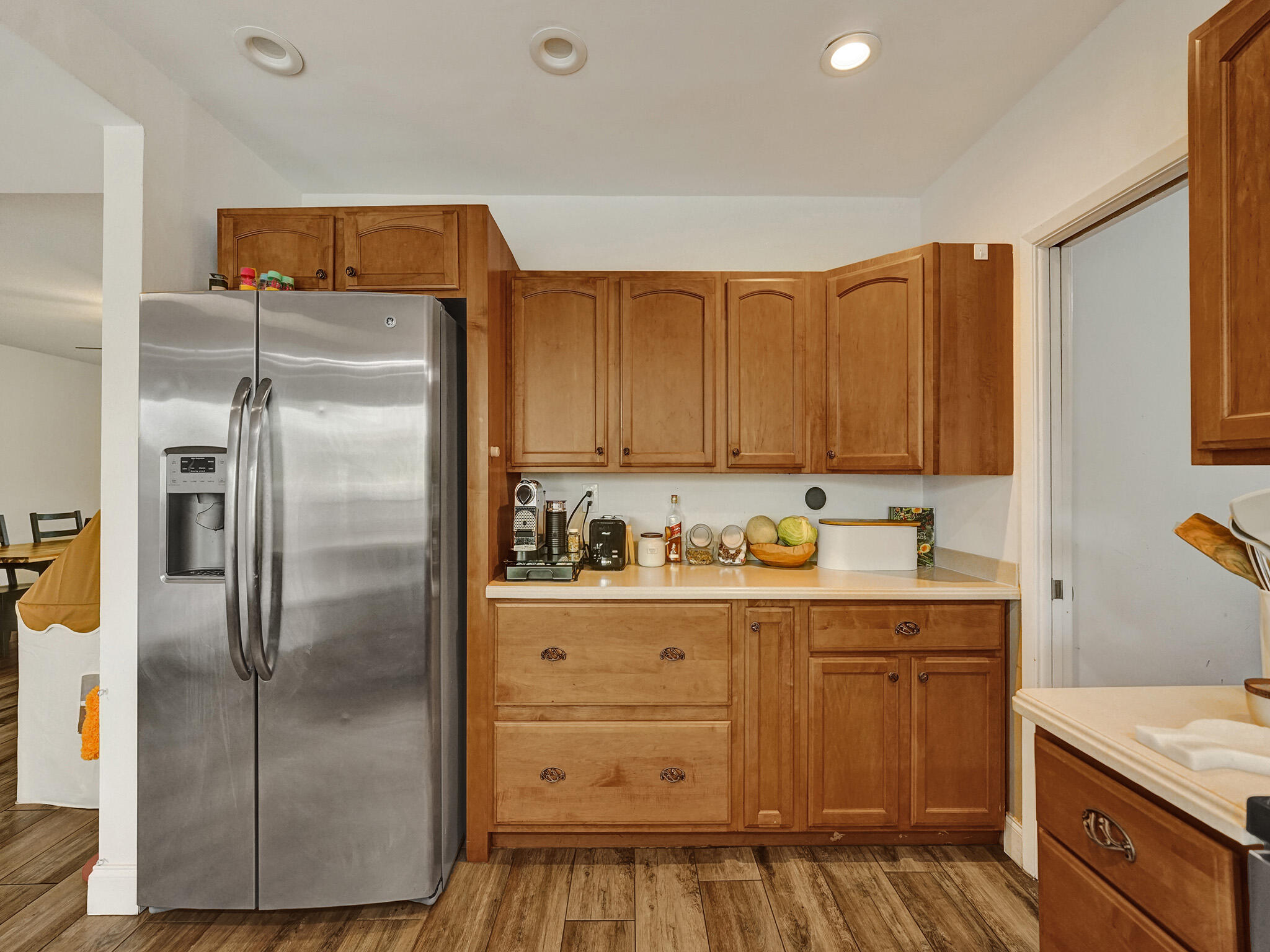 4533 Jefferson Street Hollywood, FL 33021 - Photo 19 of 29 a kitchen with stainless steel appliances granite countertop a refrigerator and a stove