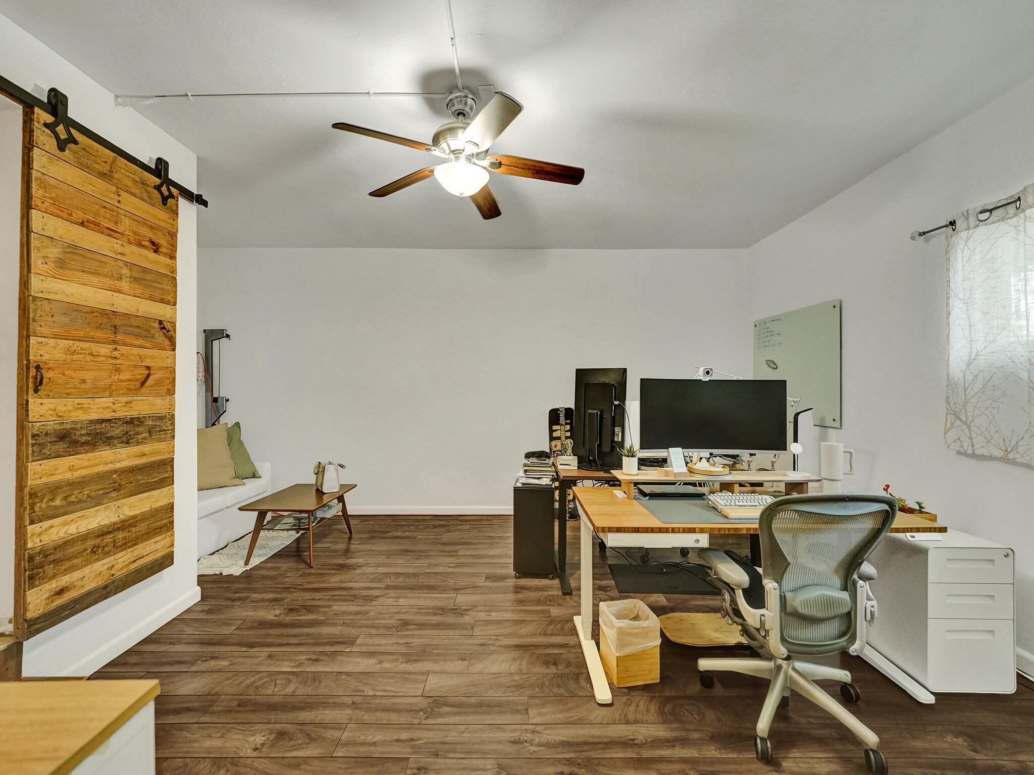4533 Jefferson Street Hollywood, FL 33021 - Photo 21 of 29 a view of a workspace with furniture and a window