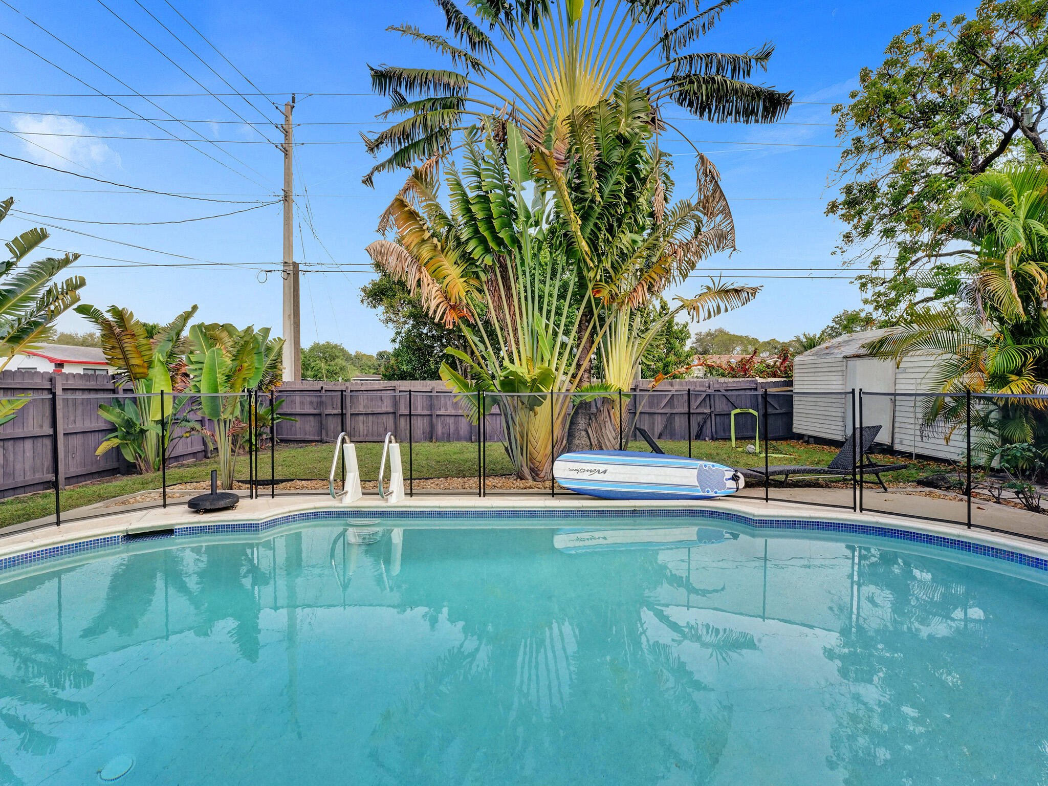 4533 Jefferson Street Hollywood, FL 33021 - Photo 28 of 29 a view of a house with swimming pool and sitting area