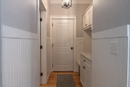 a view of an empty room with windows