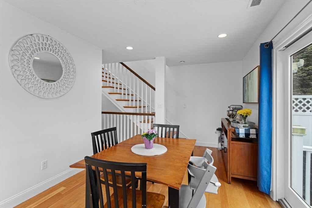 2 Chase Lane, Unit 2 Lynn, MA 01902 - Photo 12 of 42 a view of a dining room with furniture and wooden floor
