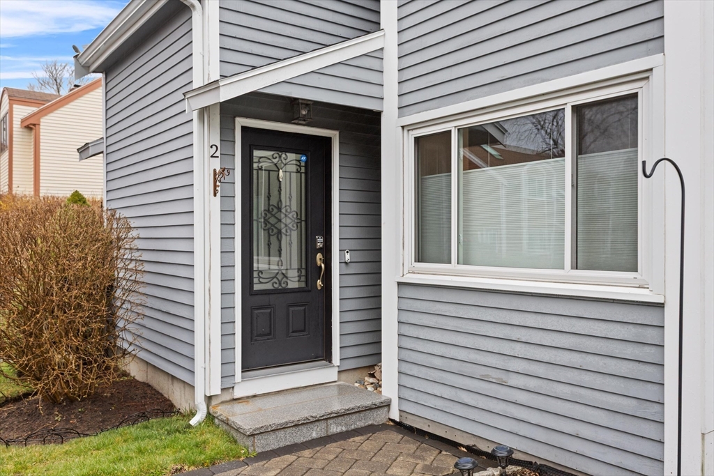 2 Chase Lane, Unit 2 Lynn, MA 01902 - Photo 2 of 42 a view of a house with a window and brick walls