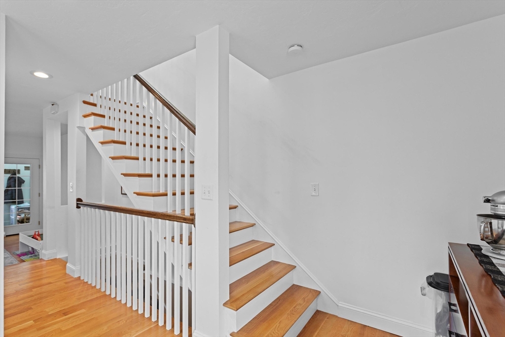 2 Chase Lane, Unit 2 Lynn, MA 01902 - Photo 25 of 42 a view of staircase with white walls