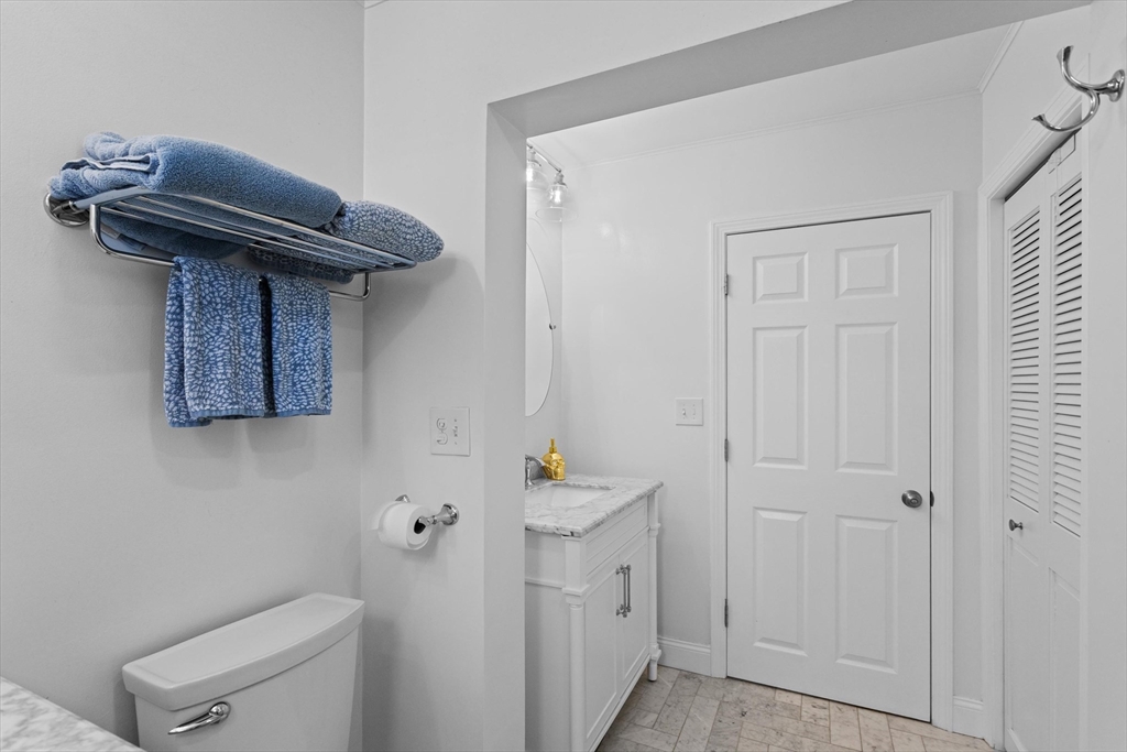 2 Chase Lane, Unit 2 Lynn, MA 01902 - Photo 30 of 42 a view of a hallway with washer and dryer