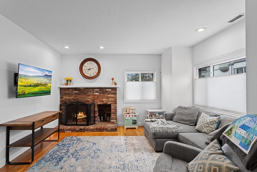 2 Chase Lane, Unit 2 Lynn, MA 01902 - Photo 5 of 42 a living room with furniture and a fireplace