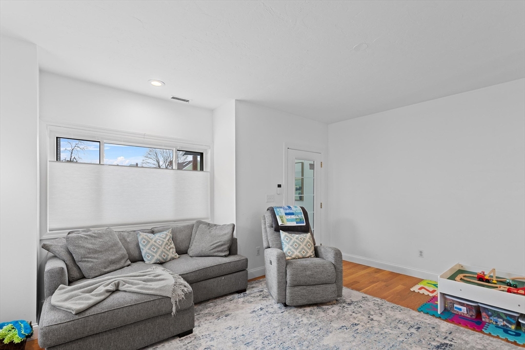 2 Chase Lane, Unit 2 Lynn, MA 01902 - Photo 6 of 42 a living room with furniture and a couch