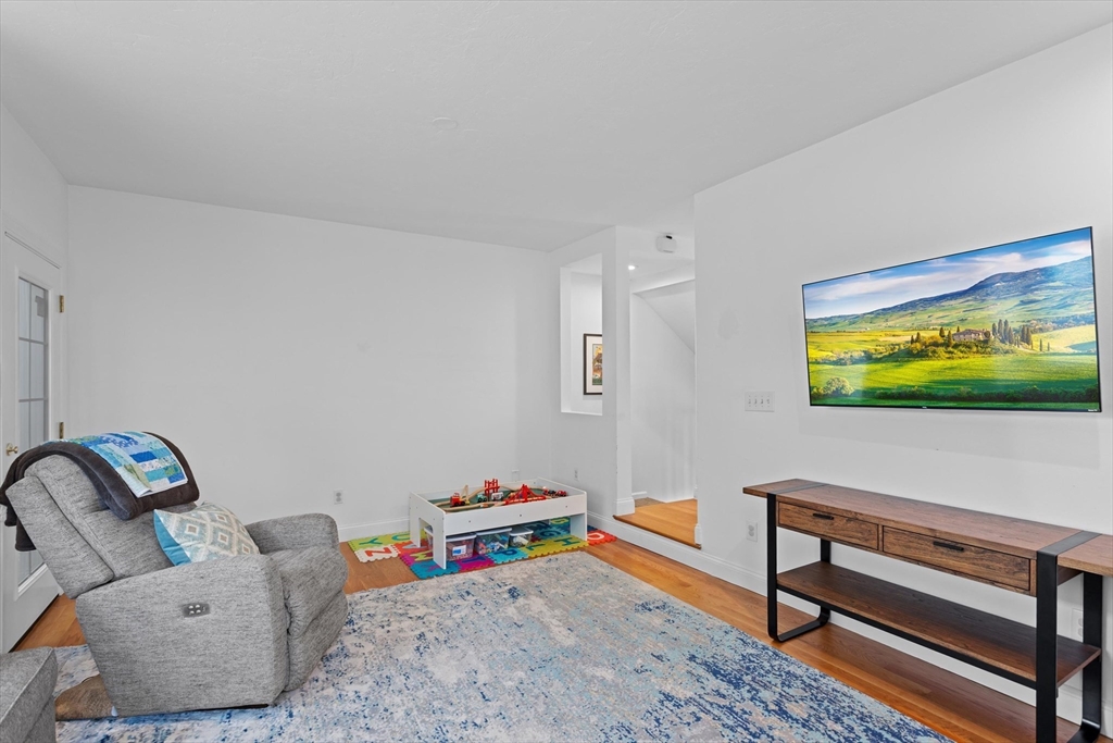 2 Chase Lane, Unit 2 Lynn, MA 01902 - Photo 7 of 42 a reading room with furniture and rug