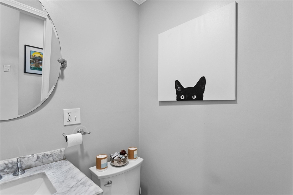 2 Chase Lane, Unit 2 Lynn, MA 01902 - Photo 10 of 42 a bathroom with a toilet and a mirror