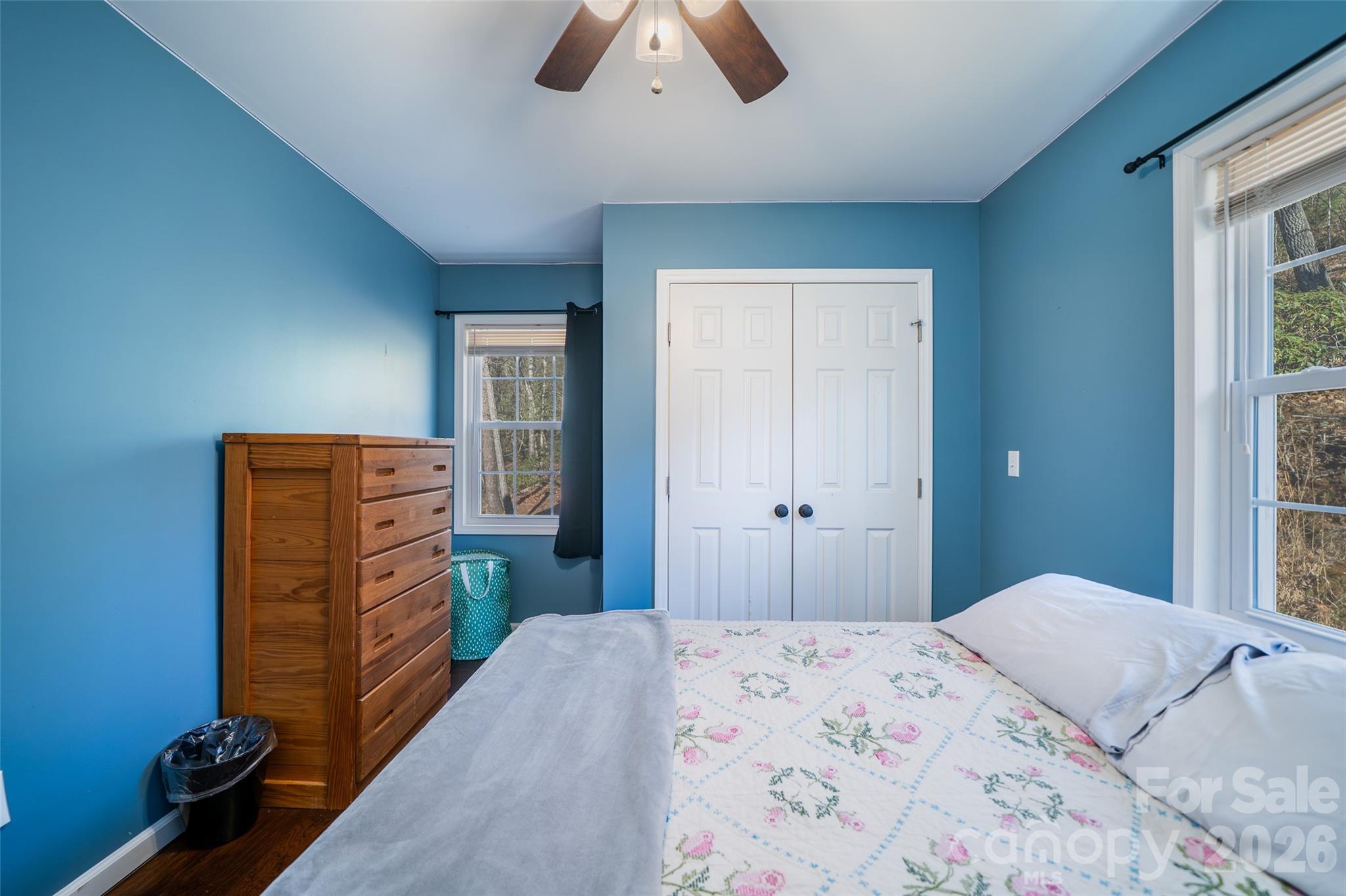 412 Masters View Drive Etowah, NC 28729 - Photo 12 of 30 a bedroom with a bed and dresser