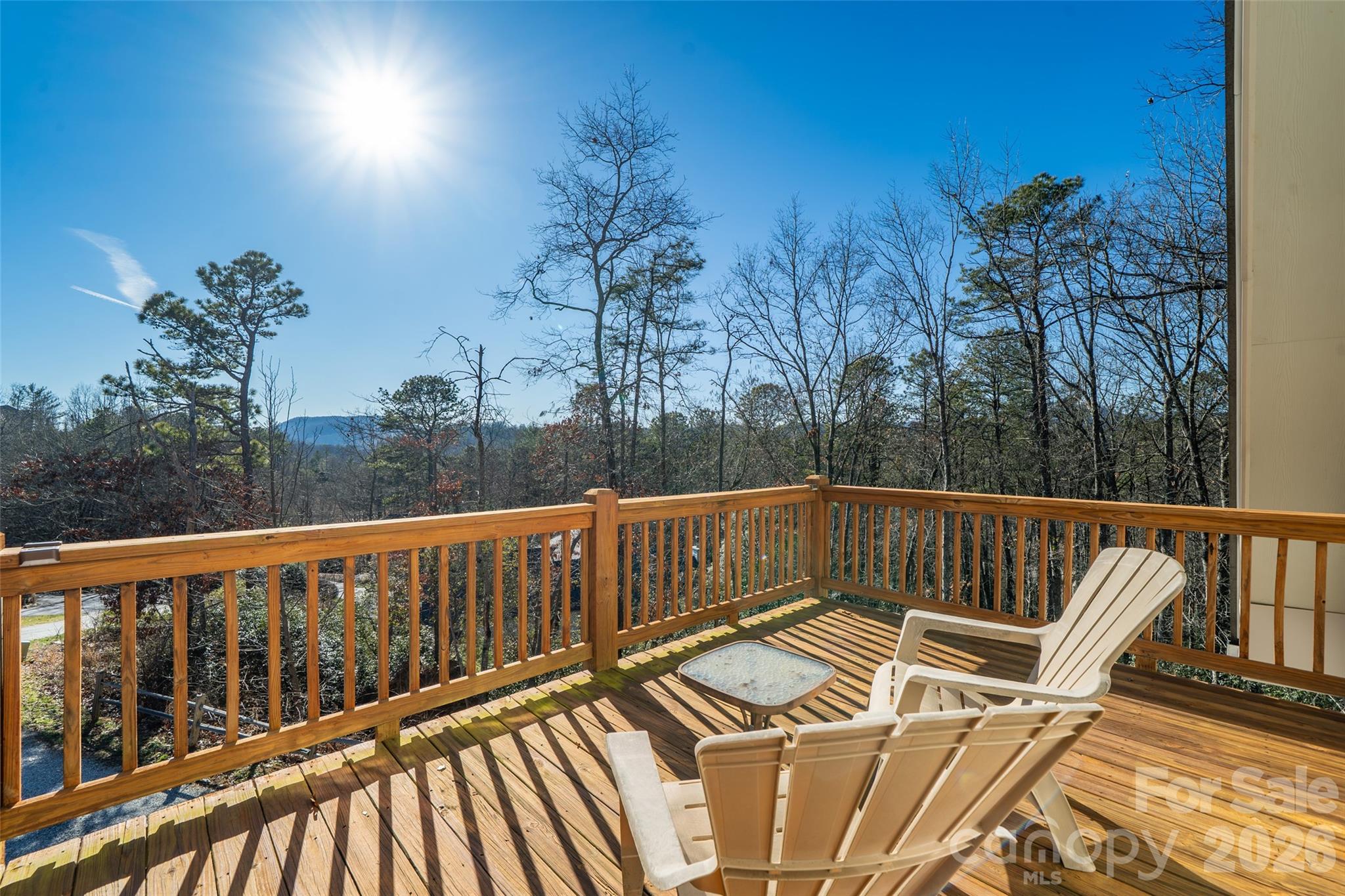 412 Masters View Drive Etowah, NC 28729 - Photo 17 of 30 a view of balcony with wooden floor and outdoor seating