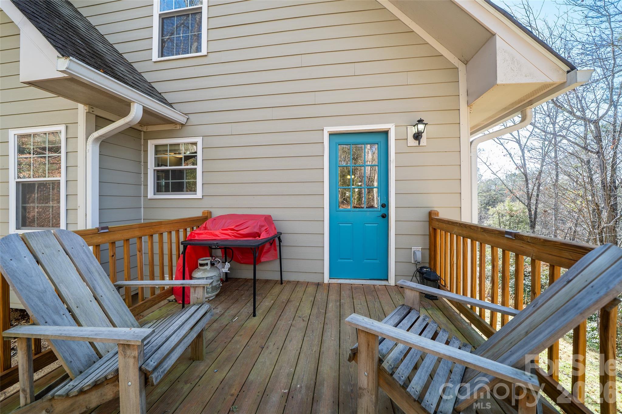 412 Masters View Drive Etowah, NC 28729 - Photo 23 of 30 a view of deck with a table and chairs