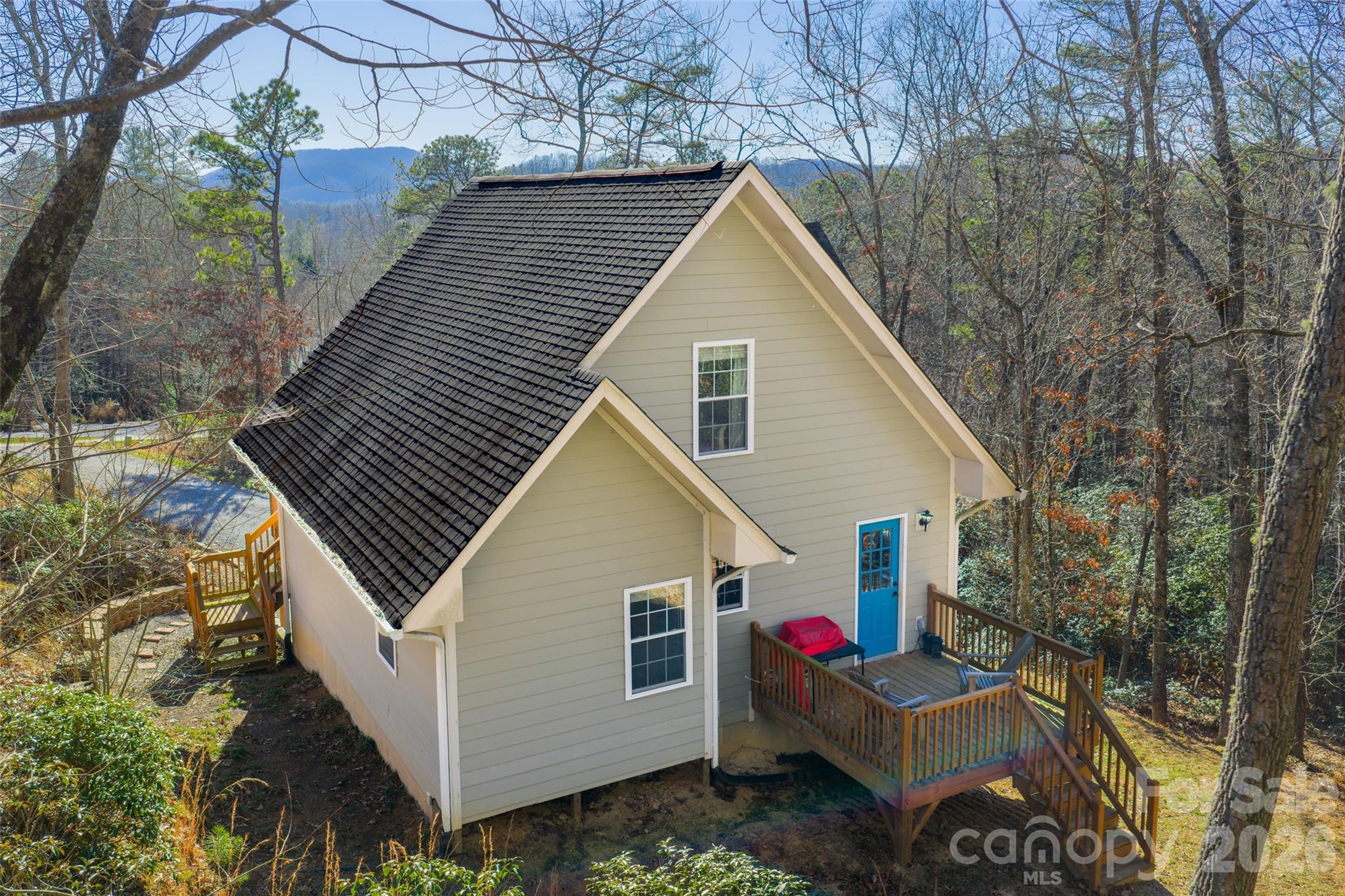 412 Masters View Drive Etowah, NC 28729 - Photo 24 of 30 a view of house with backyard