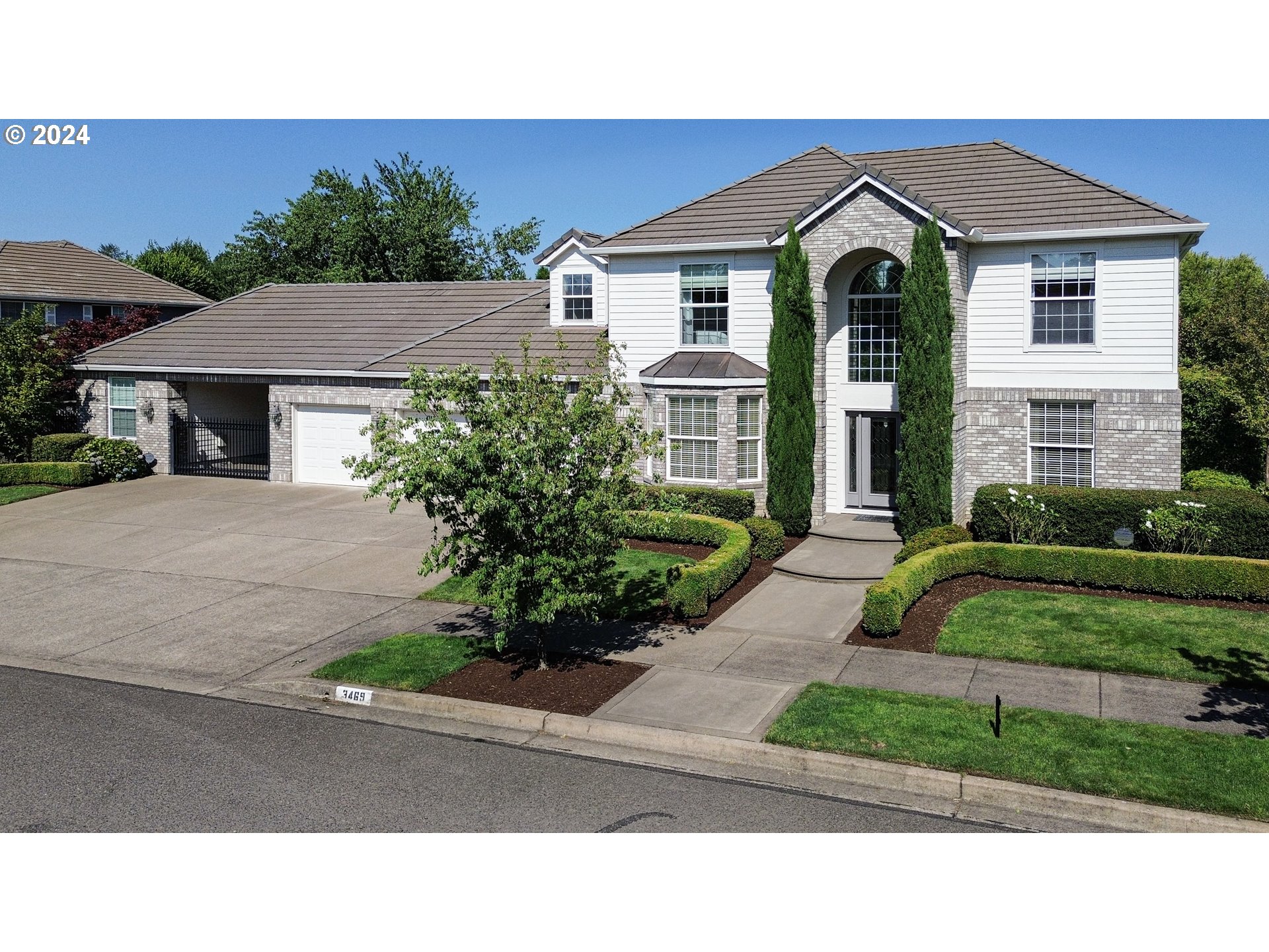 3469 River Pointe Drive Eugene, OR 97408 - Photo 1 of 48 a front view of a house with a yard