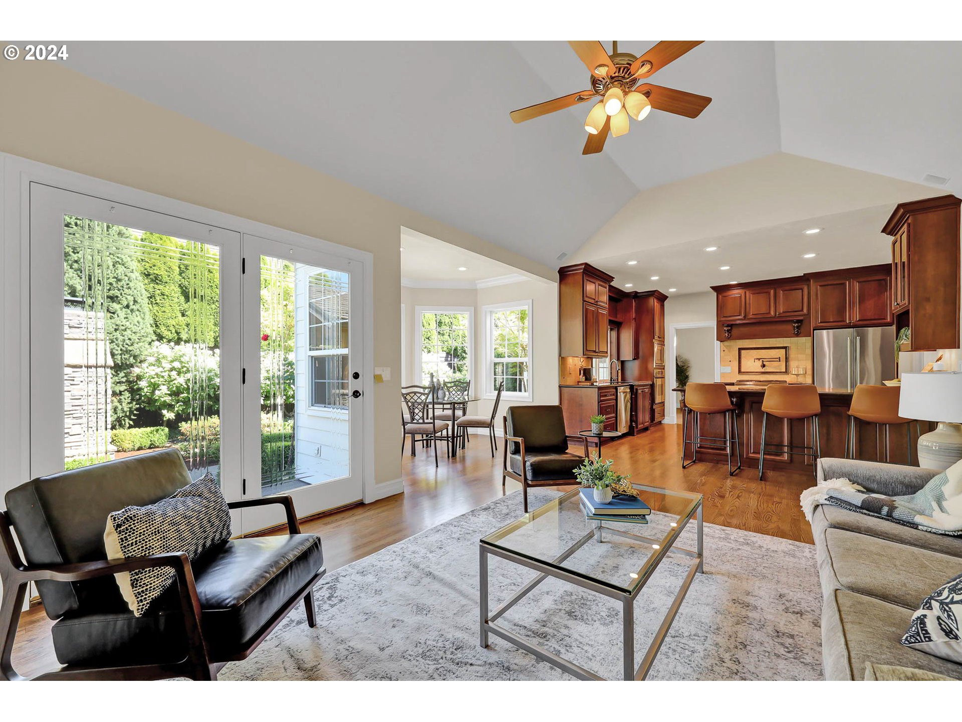 3469 River Pointe Drive Eugene, OR 97408 - Photo 15 of 48 a living room with lots of furniture and a large window