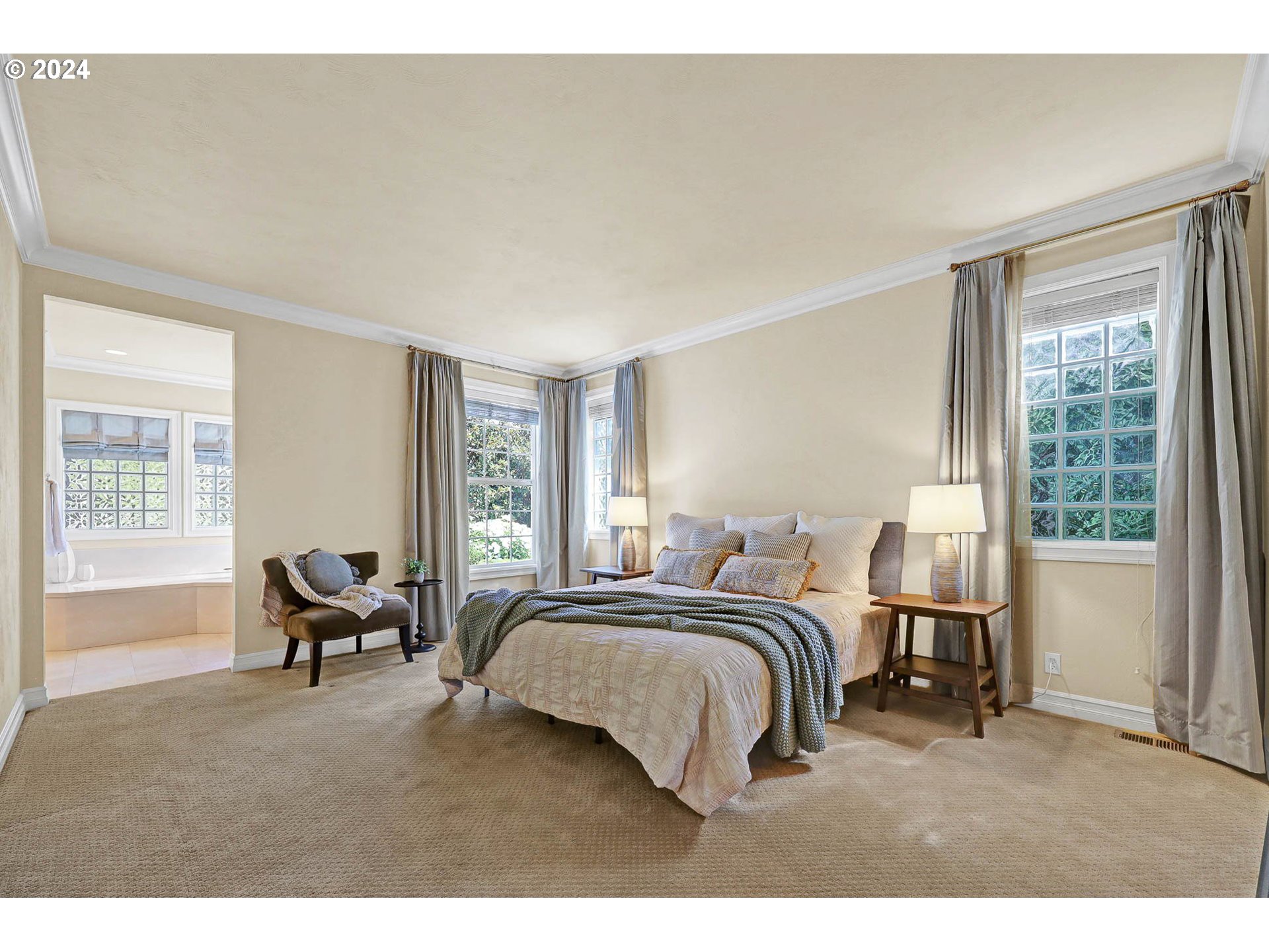 3469 River Pointe Drive Eugene, OR 97408 - Photo 19 of 48 a bedroom with a bed and large window