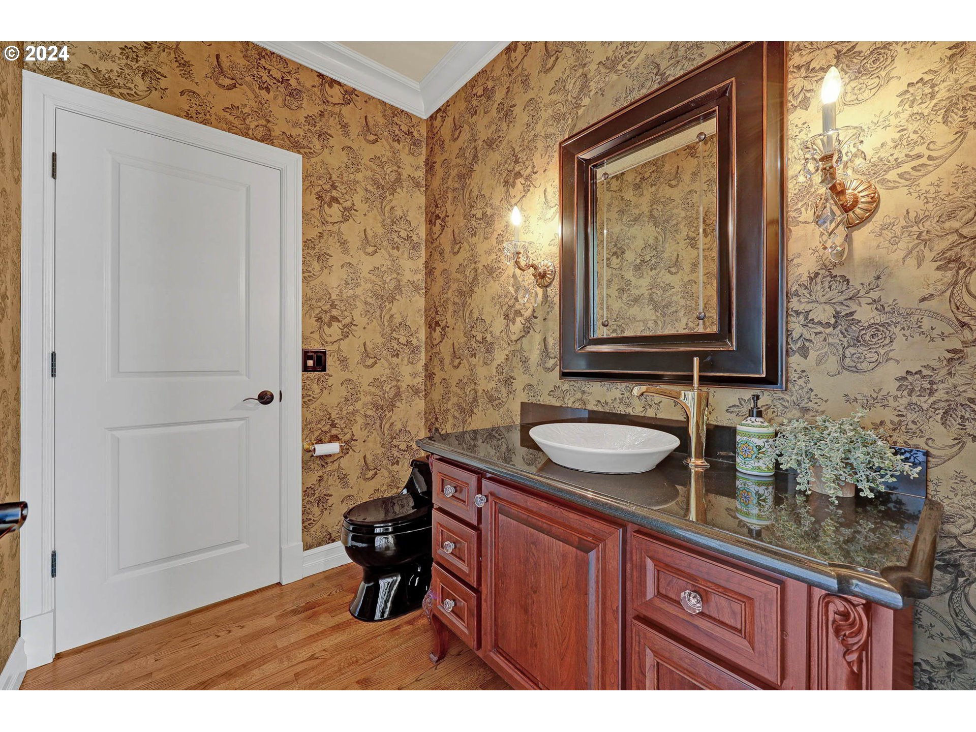 3469 River Pointe Drive Eugene, OR 97408 - Photo 25 of 48 a bathroom with a granite countertop sink a toilet and a mirror