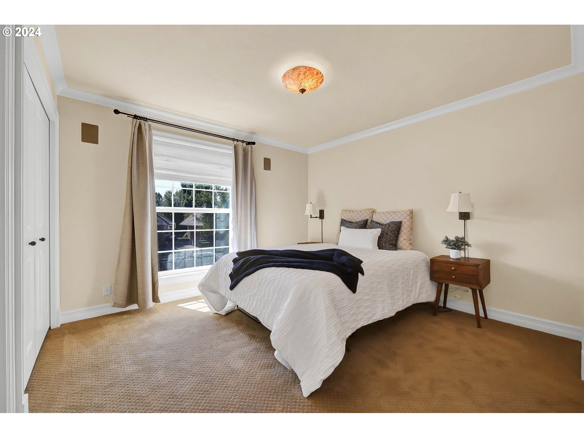 3469 River Pointe Drive Eugene, OR 97408 - Photo 27 of 48 a bedroom with a bed and a large window
