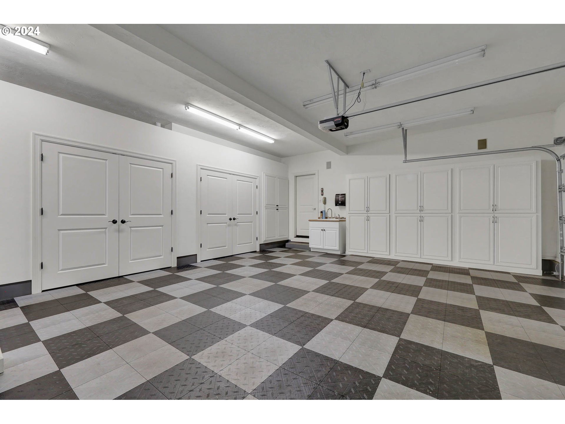 3469 River Pointe Drive Eugene, OR 97408 - Photo 32 of 48 a view of a room with a black white checkered floor