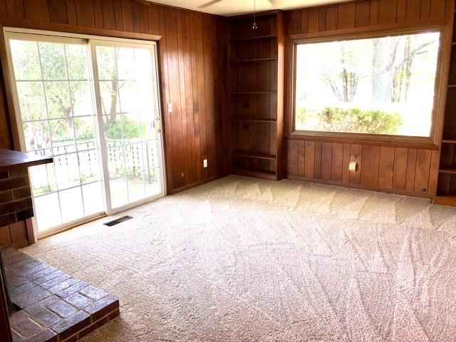 11255 Telegraph Road Pecatonica, IL 61063 - Photo 5 of 28 a view of an empty room with a window
