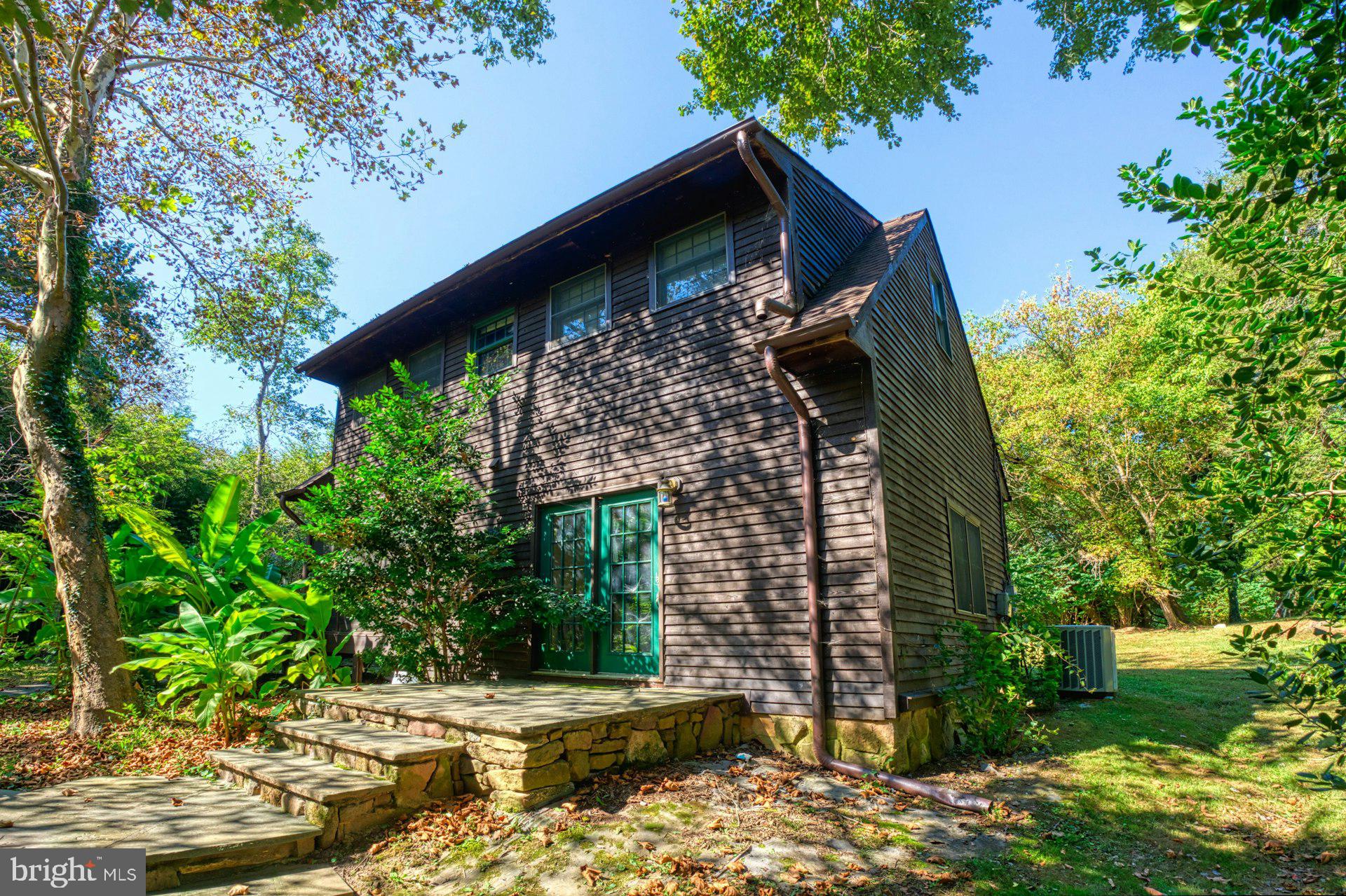 5250 Winfield Road Fairfax, VA 22030 - Photo 30 of 57 front view of a house with a tree