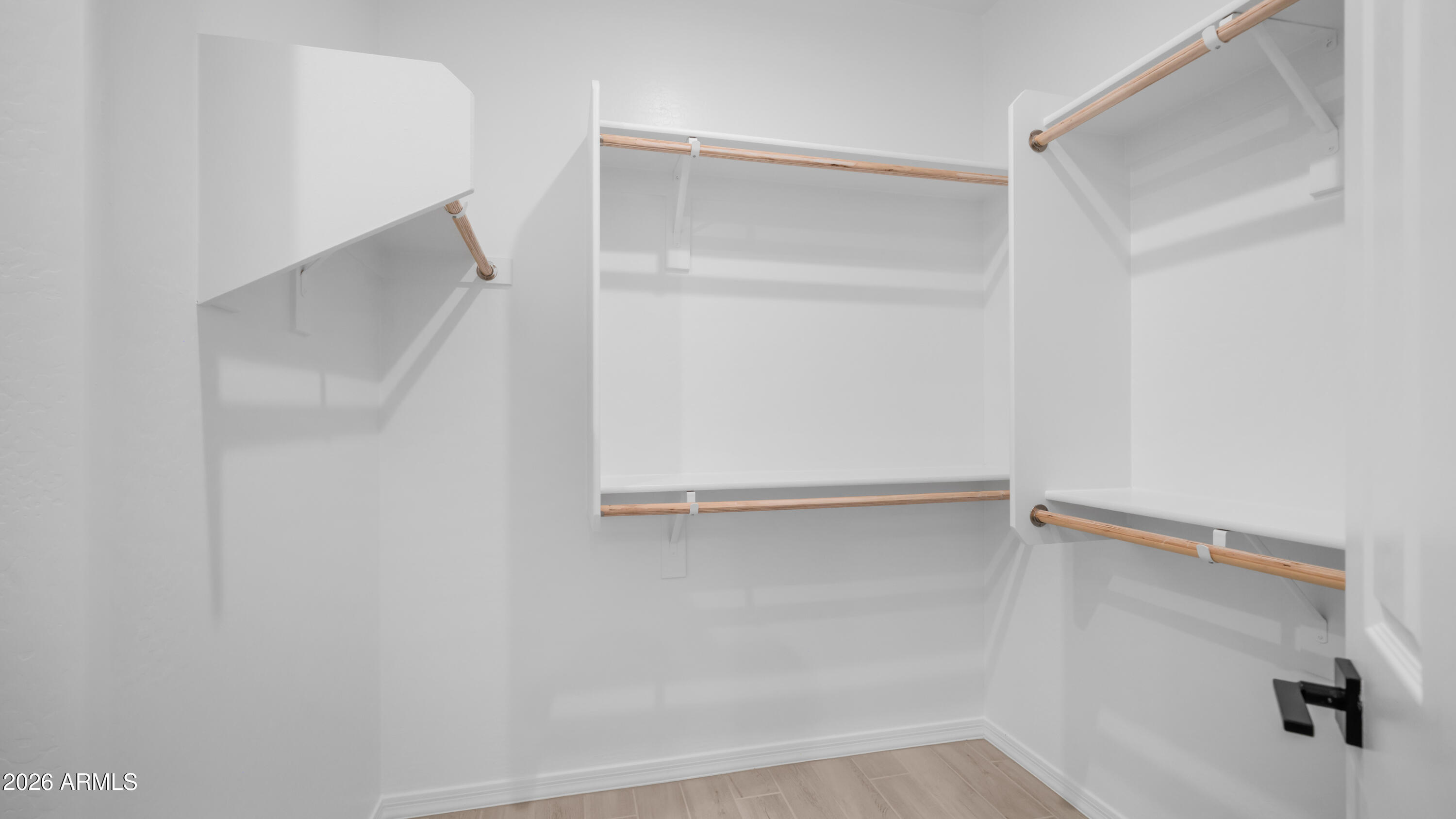 13362 West Eagle Feather Road Peoria, AZ 85383 - Photo 18 of 44 a view of an empty walk in closet