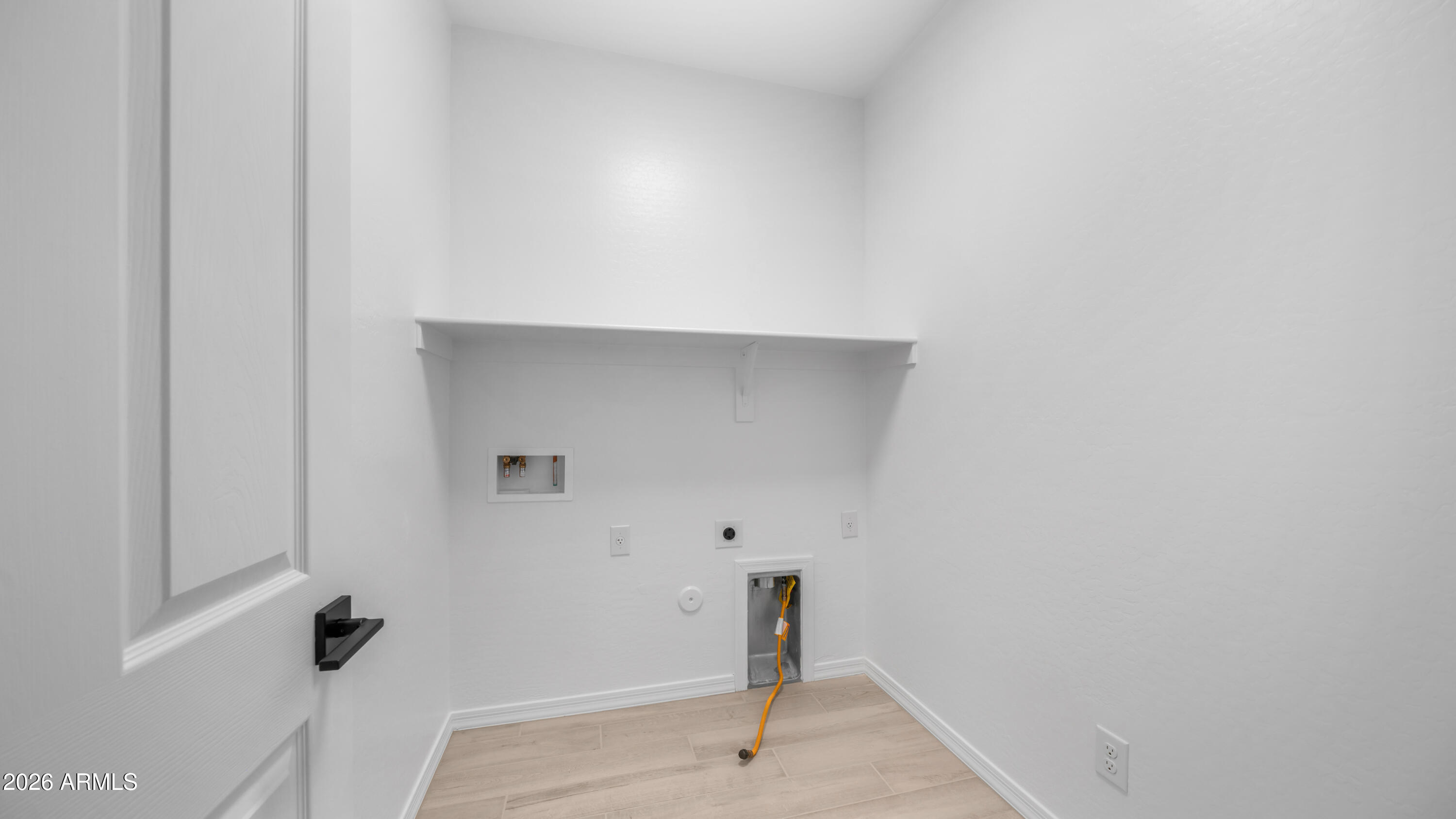 13362 West Eagle Feather Road Peoria, AZ 85383 - Photo 19 of 44 a view of entryway with wooden floor