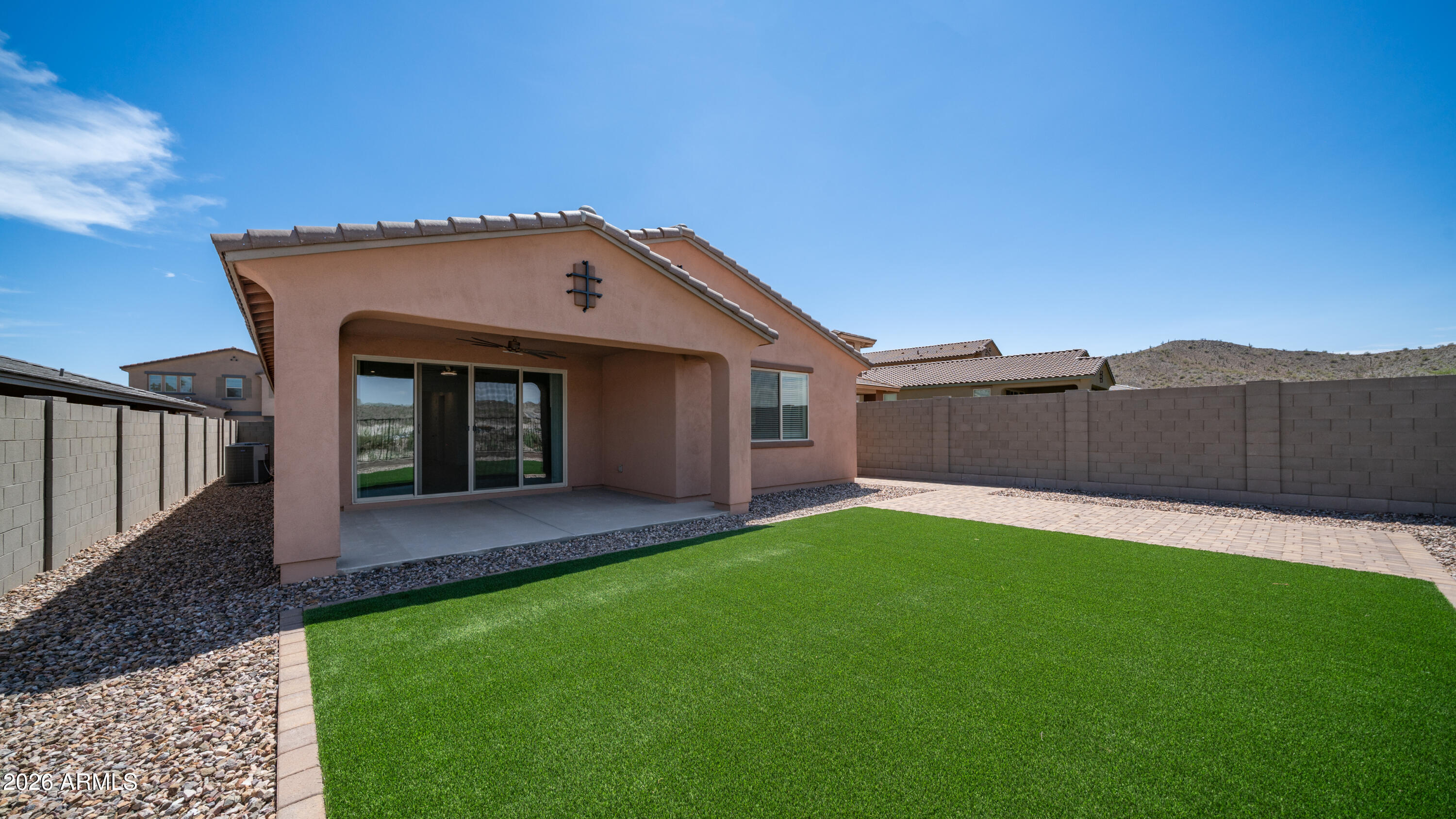 13362 West Eagle Feather Road Peoria, AZ 85383 - Photo 32 of 44 a front view of a house with a yard