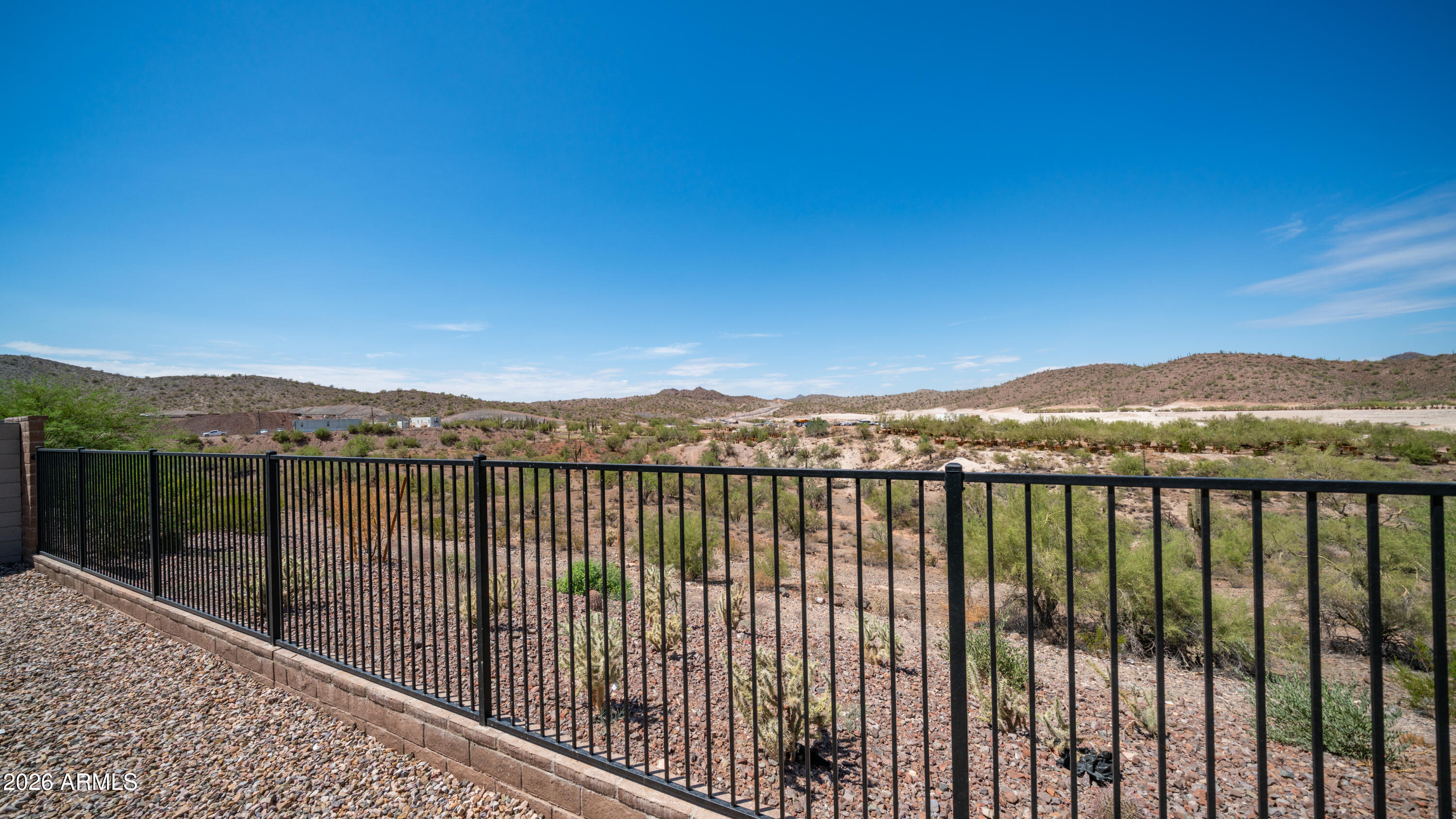 13362 West Eagle Feather Road Peoria, AZ 85383 - Photo 34 of 44 a view of a balcony with a lake view