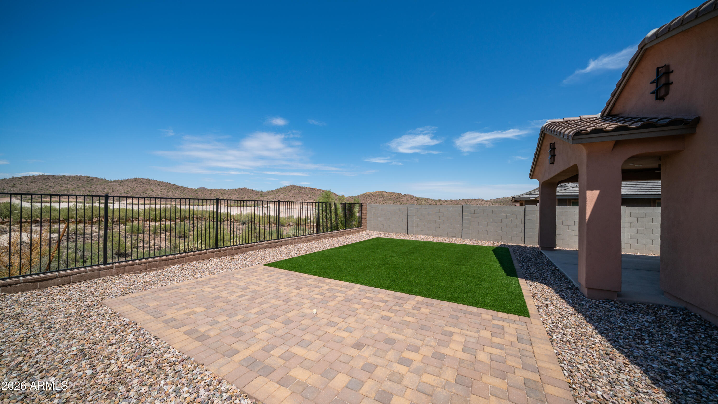 13362 West Eagle Feather Road Peoria, AZ 85383 - Photo 36 of 44 a view of a pathway with a garden
