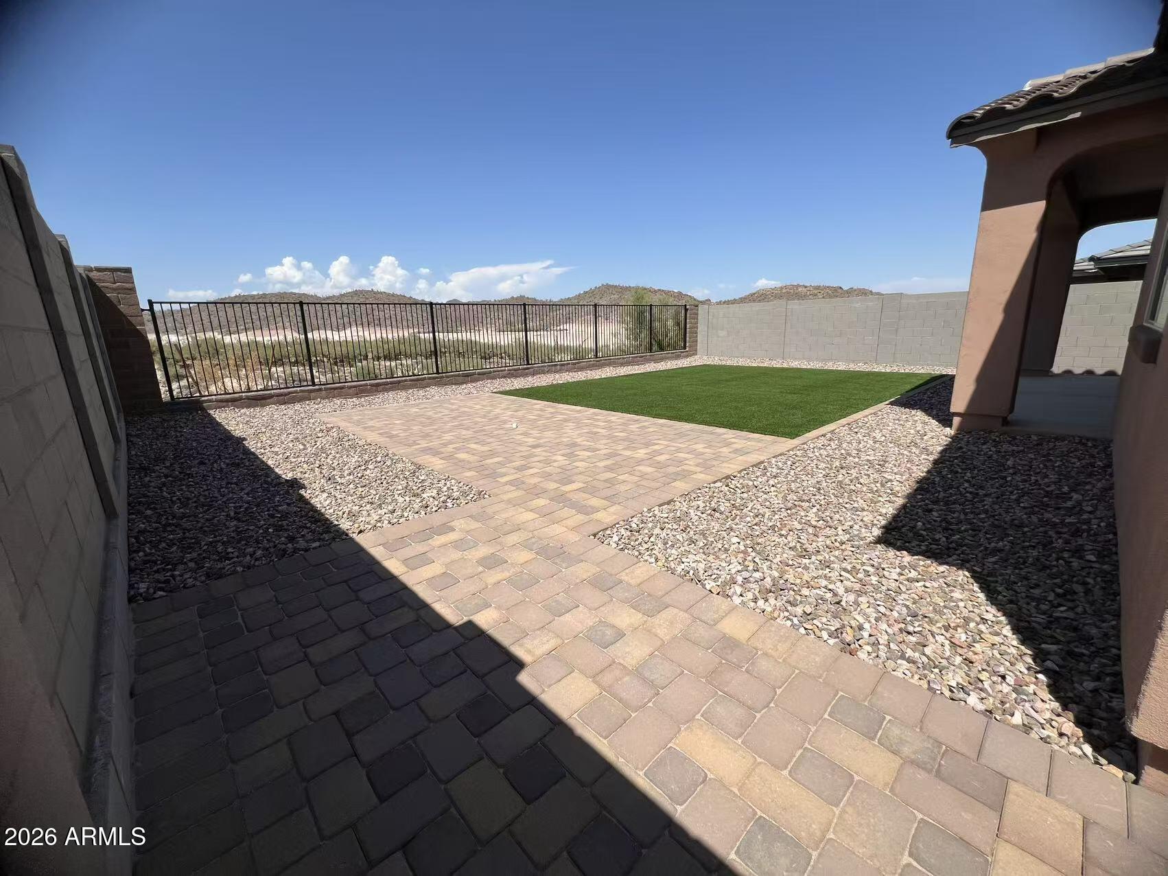 13362 West Eagle Feather Road Peoria, AZ 85383 - Photo 40 of 44 a view of a backyard