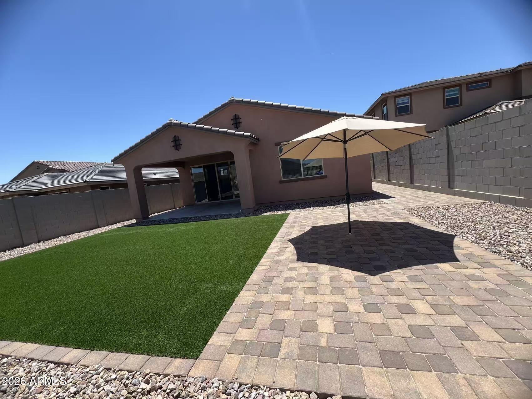 13362 West Eagle Feather Road Peoria, AZ 85383 - Photo 42 of 44 a house view with a garden space