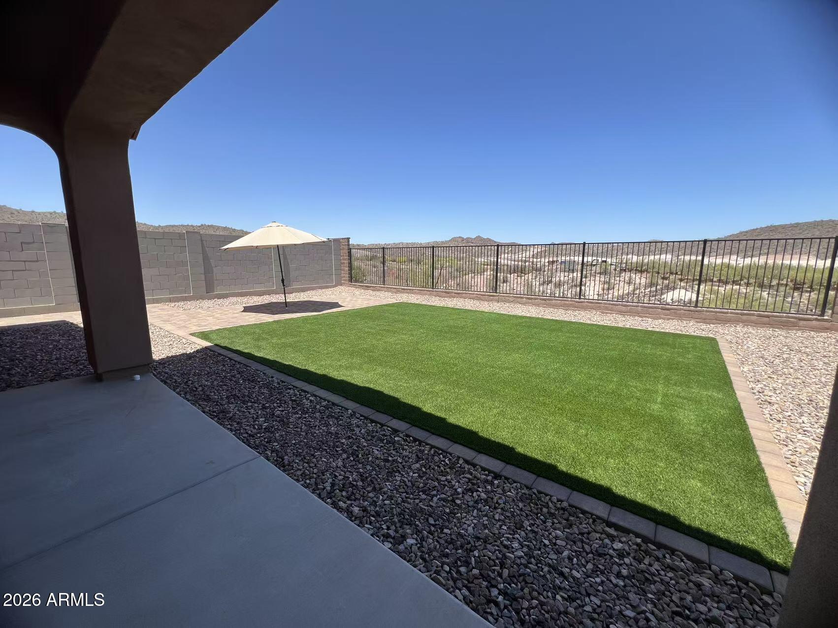 13362 West Eagle Feather Road Peoria, AZ 85383 - Photo 44 of 44 a view of a back yard of the house
